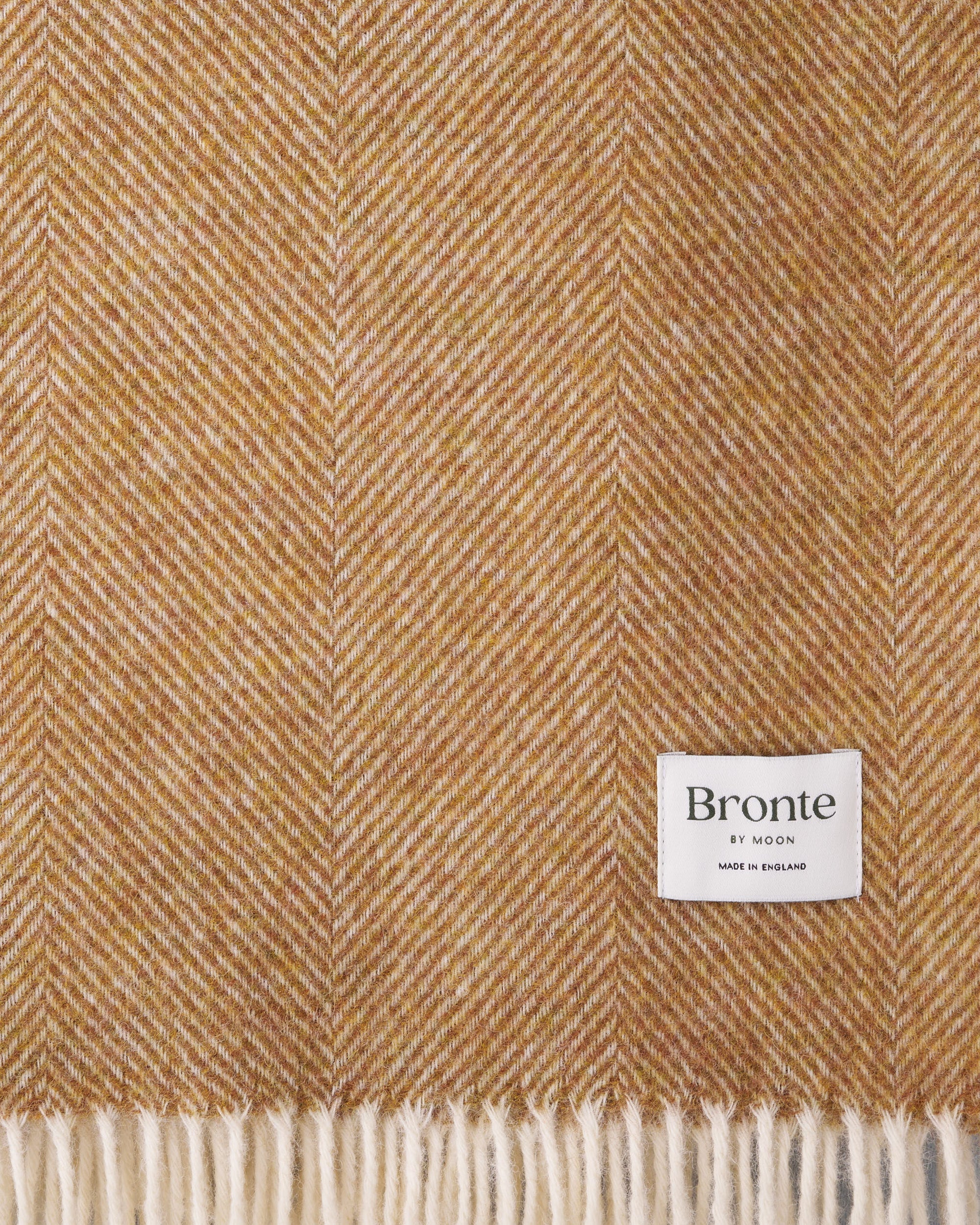 Bronte by Moon gold herringbone Shetland wool blanket throw texture closeup