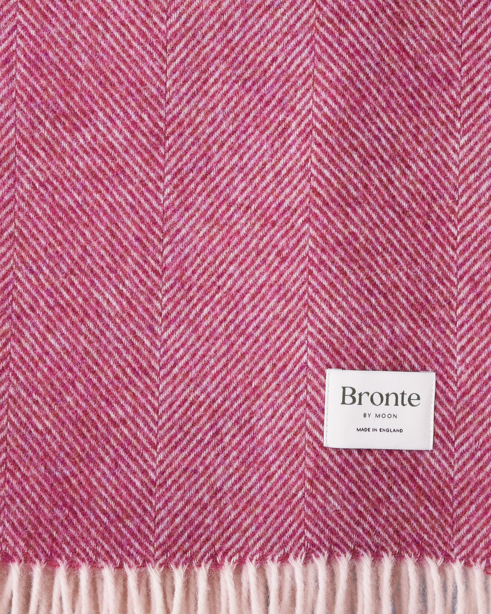 Bronte by Moon berry herringbone Shetland wool blanket throw texture closeup