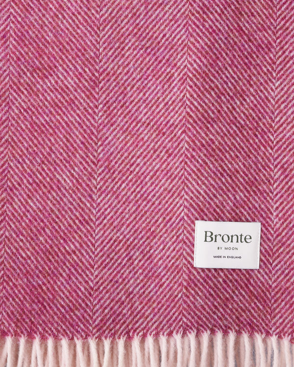 Bronte by Moon berry herringbone Shetland wool blanket throw texture closeup