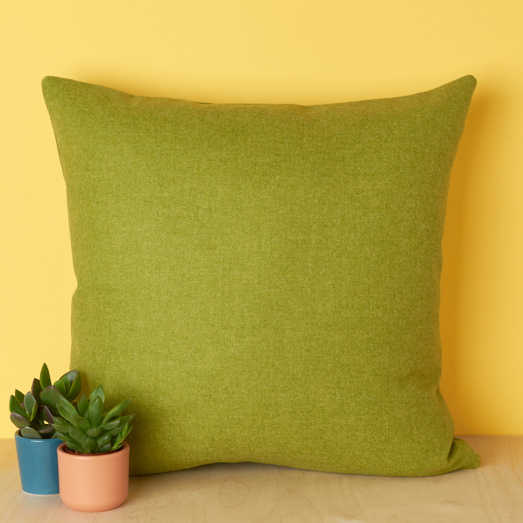 Lime green wool cushion made in UK with Abraham Moon Wool
